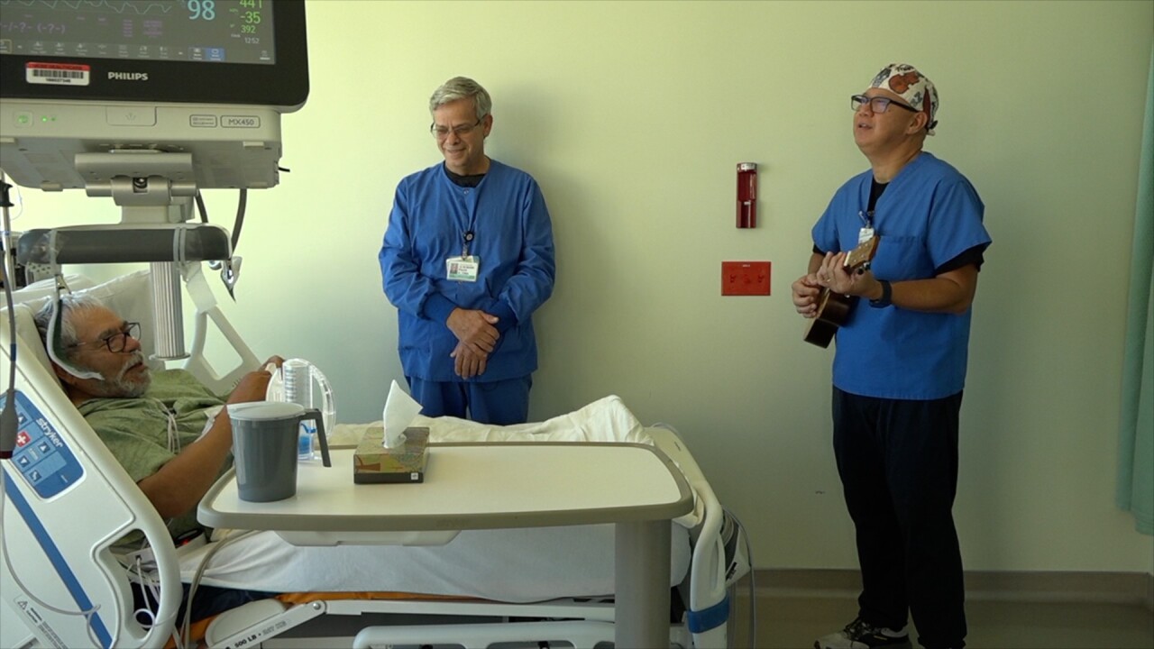 Rod Salaysay plays the ukulele for his patients at Jacobs Medical Center.