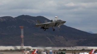 f-35 hovers at air show