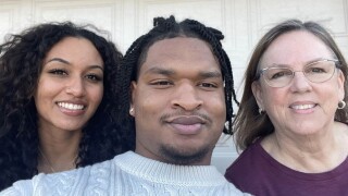 Jamal Hinton and “Grandma” Wanda Dench with a friend