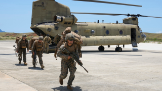 U.S. troopers alight from a U.S. Army CH-47